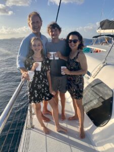 Logo of Virtuoso Family Travel with a family symbol.