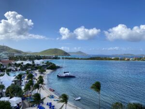 Logo of Virtuoso Family Travel with a family symbol.